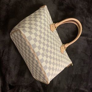 Authentic Louis Vuitton Saleya bag